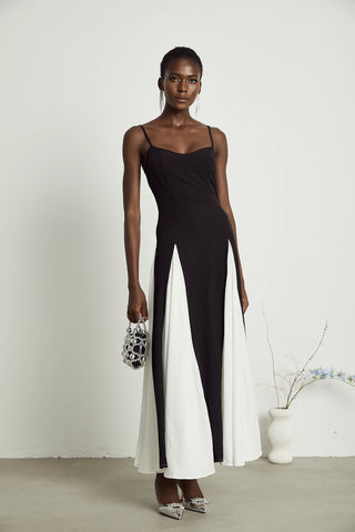Yvette black and white pleated maxi dress with adjustable straps and scoop back. Vienna Brand Shopping Fashion