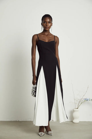Yvette black and white pleated maxi dress with adjustable straps and scoop back. Vienna Brand Shopping Fashion