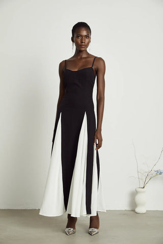 Yvette black and white pleated maxi dress with adjustable straps and scoop back. Vienna Brand Shopping Fashion