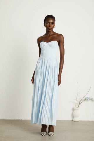 Strapless blue pleated maxi dress with shell-shaped chest cup and corset-style bodice, an elegant House of CB dupe inspired by the Marcella dress. Perfect for formal events, weddings, or as an alternative bridal gown.