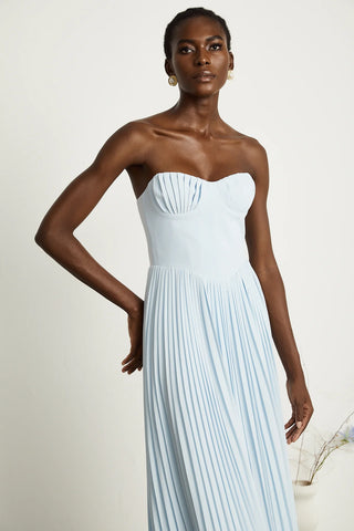 Strapless blue pleated maxi dress with shell-shaped chest cup and corset-style bodice, an elegant House of CB dupe inspired by the Marcella dress. Perfect for formal events, weddings, or as an alternative bridal gown.