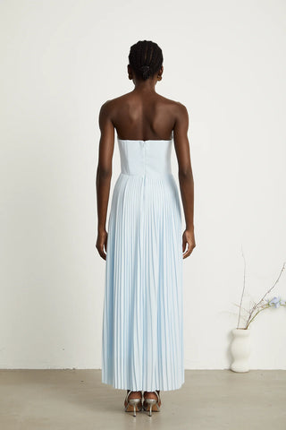 Strapless blue pleated maxi dress with shell-shaped chest cup and corset-style bodice, an elegant House of CB dupe inspired by the Marcella dress. Perfect for formal events, weddings, or as an alternative bridal gown.