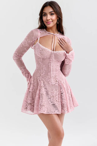 Blush lace mini dress with long sheer sleeves, a flirty cutout neckline with a ribbon tie, and a flattering fit-and-flare silhouette. Perfect for date nights, weddings, and special occasions.