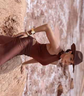 Full-length brown maxi dress for summer in Europe, with high neck and soft draping skirt