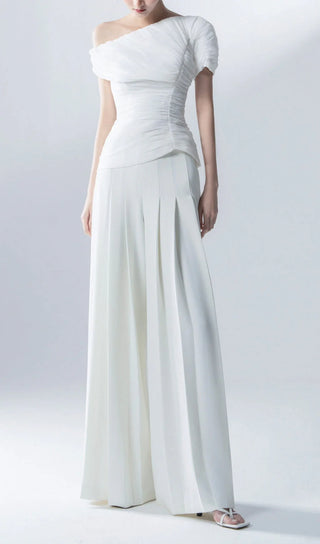 SEZAN | White Two Piece Pant Suit - Cielie White pant suit set bridal - Asymmetric off-shoulder top with entire gathering detail and fitted waist, paired with wide-leg pleated pants. Perfect for modern brides, business attire, and summer events. Elegant and sophisticated design ideal for versatile occasions.