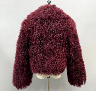 Luxurious bordeaux wine red Mongolian fur jacket coat with a fluffy big collar, showcasing its elegant cropped design and real sheep fur craftsmanship. Fur Jacket Burgundy Real - Cielie