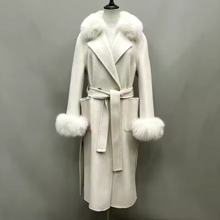 Classic white maxi cashmere wool coat with luxurious fox fur collar and cuffs, featuring side pockets and a flattering belted waist.