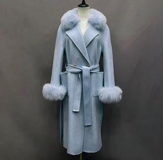 Chic maxi cashmere wool coat in baby blue with genuine fox fur details on collar and cuffs, complete with side pockets and an adjustable belt.