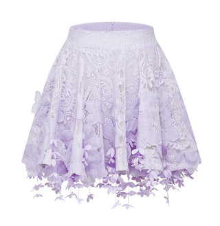 Woman wearing a lavender lace two-piece summer set with short-sleeve buttoned top and floral embroidered flared skirt, perfect for vacation or coastal getaway.