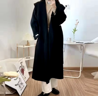 Elegant black cashmere wool coat with a belted waist and large lapel, showcasing its sophisticated double-sided design. Cielie Max Mara Coat