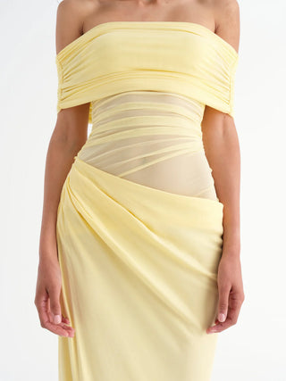 Yellow off-shoulder dress with a draped design on a white background