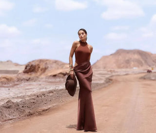 Full-length brown maxi dress for summer in Europe, with high neck and soft draping skirt
