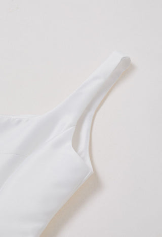 Minimalistic flared white midi A line Flared dress with square neckline available in various colors, perfect for elegant events or cocktail dress rental in Vienna. Bridal dress elegant minimal