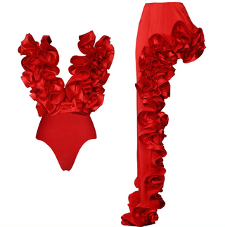 Red ruffled two-piece beach set featuring a bikini with a matching asymmetric skirt. Stylish swimsuit and cover-up combination in polyester/spandex for a bold, elegant beachwear look. Cielie Vienna