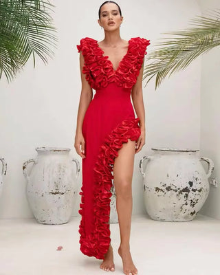 Red ruffled two-piece beach set featuring a bikini with a matching asymmetric skirt. Stylish swimsuit and cover-up combination in polyester/spandex for a bold, elegant beachwear look. Cielie Vienna