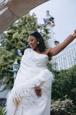 One Shoulder Maxi Gown Dress White Ivory Creme with Feathers trimmed for modern bridal dress feathers vogue designer Ubud one-shoulder feather-trimmed crepe maxi dress Taller Marmo Style Similar brand sale