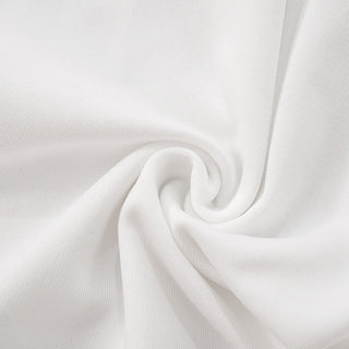 Close-up of white fabric with a subtle wave pattern