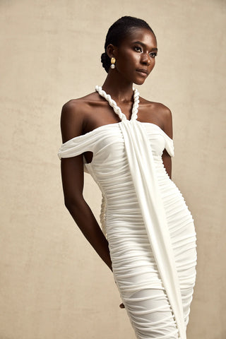 Model wearing the Elonia White Beaded Midi Dress with off-the-shoulder design, ruched pleats, braided rope detailing, and a flattering midi length, styled for summer elegance and special occasions. Cielie Vienna Shopping Fashion Brand Viennese Famous Brands