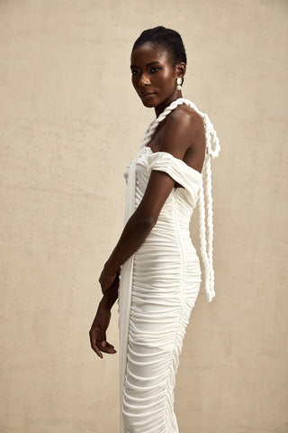 Model wearing the Elonia White Beaded Midi Dress with off-the-shoulder design, ruched pleats, braided rope detailing, and a flattering midi length, styled for summer elegance and special occasions. Cielie Vienna Shopping Fashion Brand Viennese Famous Brands