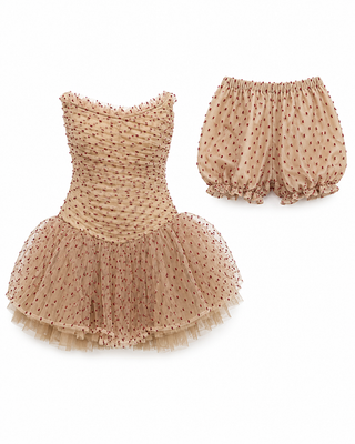 A two-piece toddler girl's outfit set featuring a strapless tulle tutu dress and matching bloomers in a warm beige color with small red polka dots, displayed on a clean white background.