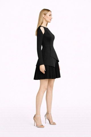 Woman wearing a black dress on a white background