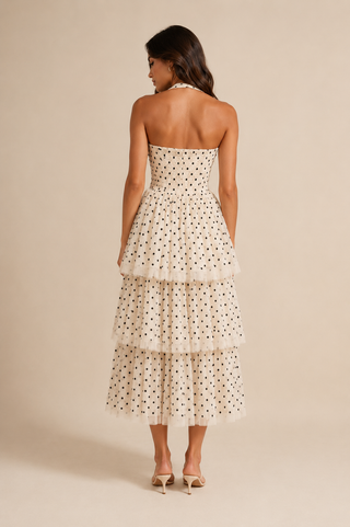 Dianna ivory polka dot halter midi dress with structured corset bodice, tiered tulle skirt, feminine fit and flare silhouette, elegant wedding guest and cocktail occasion dress.