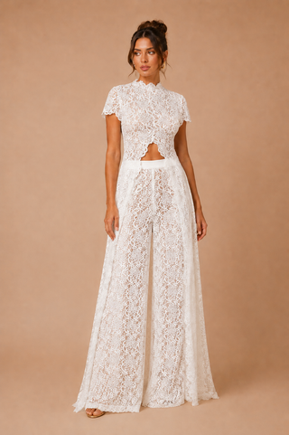 Ivory lace two piece set with asymmetrical lace top and wide leg lace trousers, elegant bridal outfit, modern wedding alternative, luxury lace occasion wear.