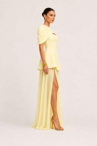 Buttercream yellow 3-piece convertible formal dress set featuring structured cape, tailored mini dress, detachable maxi overlay skirt, elegant wedding guest dress and bridesmaid gown for special occasions.