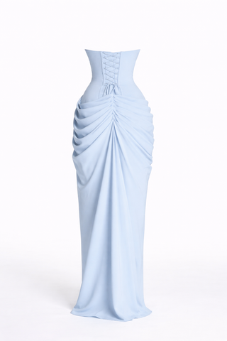 Light blue evening gown with ruched design on a white background