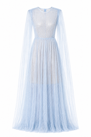 A light blue tulle maxi dress with a sheer lace bodice, long draped sleeves, and a flared skirt, shown against a plain white background.