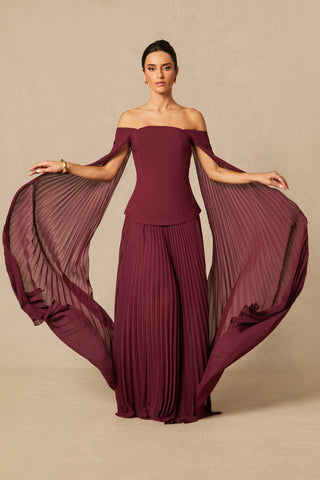 Model wearing burgundy off-shoulder two-piece formal set with pleated chiffon cape sleeves and maxi skirt Burgundy Winter Winered Chiffon Pleated Skirt 