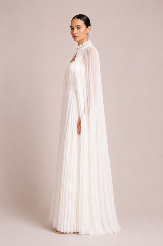 Bridal Maxi Dress with Cape White A line Elysia white convertible bridal gown featuring a strapless pleated wedding dress with removable flowing cape and hidden back zipper for modern brides and elegant wedding ceremonies