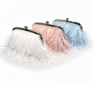 Three feathered handbags in white, pink, and blue on a white background