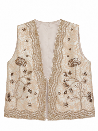 A sleeveless beige vest with intricate gold sequin embroidery in a tree and floral pattern, set against a plain white background.