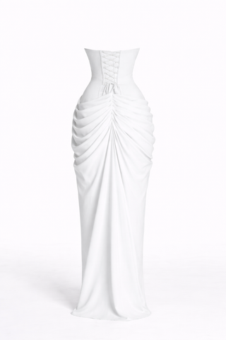 White evening gown with ruched design on a white background
