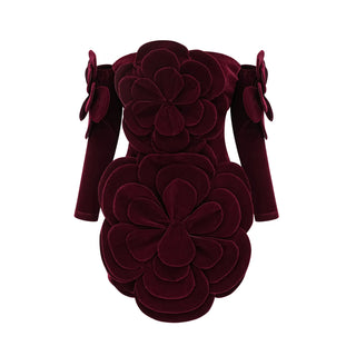 Model wearing a wine-red velvet off-the-shoulder dress with large floral appliqué detailing and matching gloves, creating an elegant and sophisticated look for special occasions. Cielie Vienna Fashion 