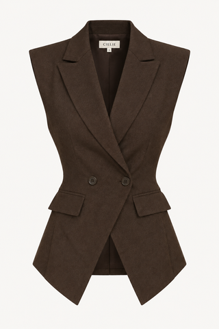 A dark brown sleeveless wrap blazer with structured shoulders, a double-breasted front, and flap pockets, shown on a plain light background. The brand label inside the collar reads 'UNIQAL'.