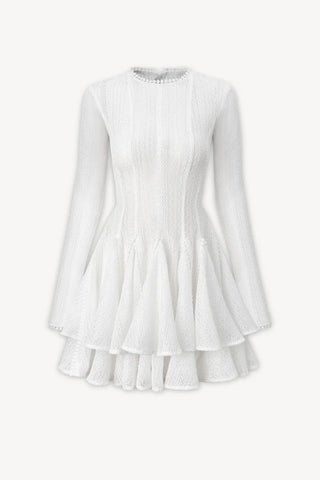 White crochet long sleeve mini dress with lace trim and ruffled double-layered skirt.