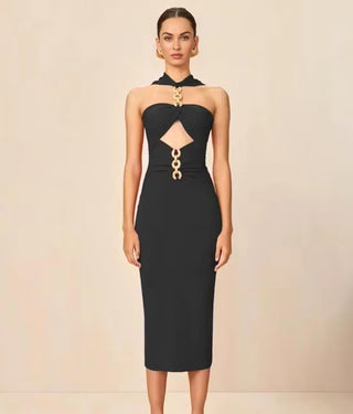 Black knit midi dress with gold chain details and cutout design, halter neckline, and scoop back.