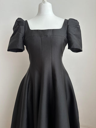 Vintage style Dior-inspired elegant black cocktail dress, midi A-line flared gown, Cielie Vienna designer fashion, perfect for rentals, balls, and shopping in Vienna.