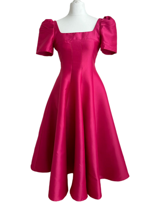 Vintage inspired pink cocktail dress, elegant midi A-line flared gown by Cielie, perfect for bridesmaids, formal events, or chic parties. Designed in Vienna, available for purchase or rental.