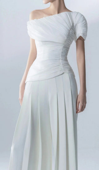 SEZAN | White Two Piece Pant Suit - CielieWhite pant suit set bridal - Asymmetric off-shoulder top with entire gathering detail and fitted waist, paired with wide-leg pleated pants. Perfect for modern brides, business attire, and summer events. Elegant and sophisticated design ideal for versatile occasions.