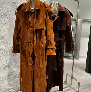 Luxurious long maxi suede real leather coat in camel, featuring a soft suede texture and adjustable belted waist for a tailored fit. Saint Laurent inspired Suede Maxi Coat Cielie Vienna 