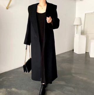 Elegant black cashmere wool coat with a belted waist and large lapel, showcasing its sophisticated double-sided design. Cielie Max Mara Coat 