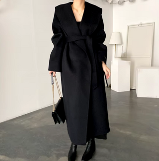 Elegant black cashmere wool coat with a belted waist and large lapel, showcasing its sophisticated double-sided design. Cielie Max Mara Coat 