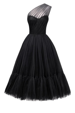 Elegant black cocktail dress with asymmetric neckline and flowing tulle skirt.