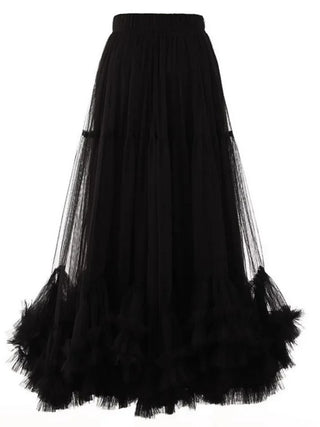 black tulle midi skirt with romantic ruffled hem and elastic waistband.