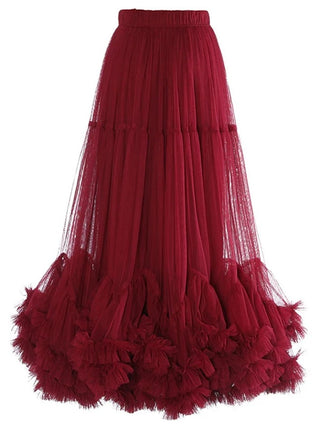 Red tulle midi skirt with romantic ruffled hem and elastic waistband.