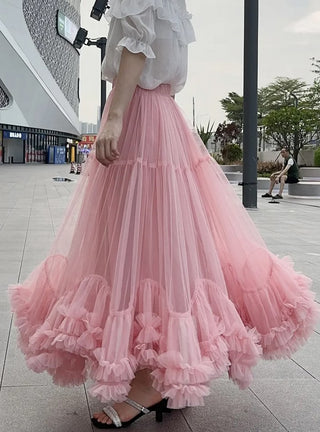 Pink tulle midi skirt with romantic ruffled hem and elastic waistband.