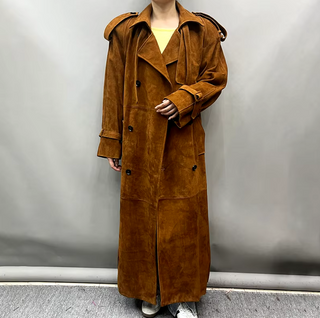 Luxurious long maxi suede real leather coat in camel, featuring a soft suede texture and adjustable belted waist for a tailored fit. Saint Laurent inspired Suede Maxi Coat Cielie Vienna 